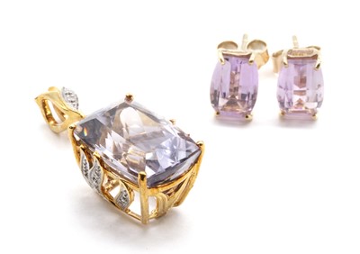 Lot 309 - A 9ct gold amethyst and diamond pendant