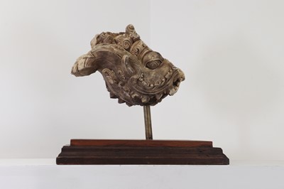 Lot 52 - A carved white stone fragment