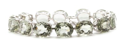 Lot 221 - A silver prasiolite quartz bracelet
