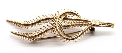 Lot 81 - A 9ct gold fern spray brooch
