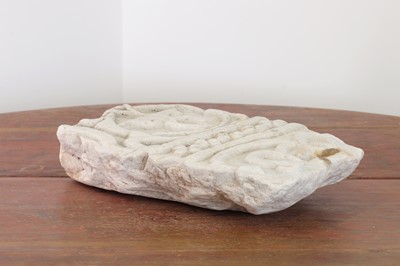 Lot 141 - A carved marble fragment