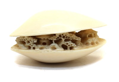 Lot 144 - A Japanese ivory okimono