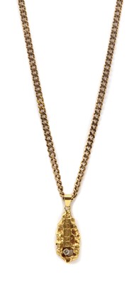 Lot 74 - A 22ct gold diamond set pendant