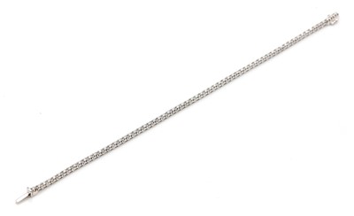 Lot 372 - A single row diamond line bracelet