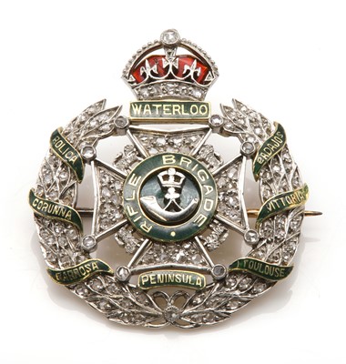 Lot 201 - A two colour gold Rifle Brigade diamond and enamel regimental brooch