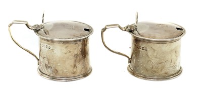 Lot 34 - A pair of George III silver drum mustards pots