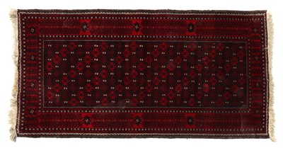 Lot 209 - A Baluch tribal wool rug