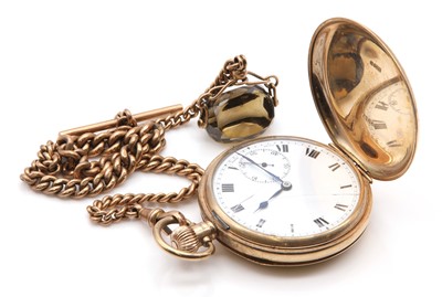 Lot 552 - A 9ct gold side wind hunter pocket watch