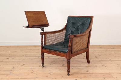 Lot 225 - A mahogany bergère library armchair