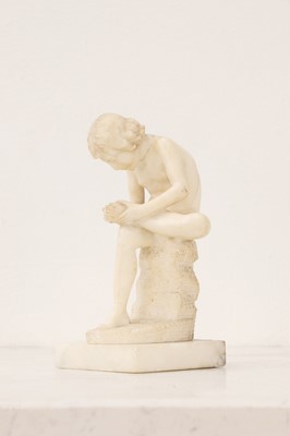 Lot 193 - A small grand tour alabaster figure of Spinario