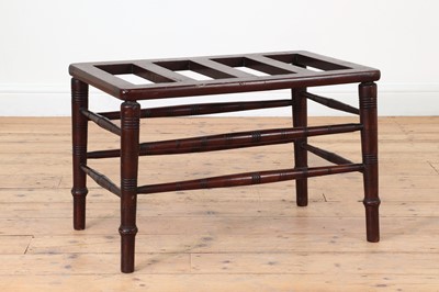Lot 27 - A Victorian Aesthetic period walnut luggage rack