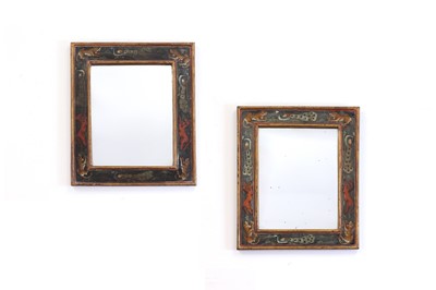 Lot 100 - A pair of polychrome painted teak-framed mirrors