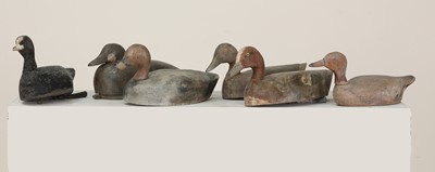 Lot 455 - A group of six carved wooden and painted decoy ducks