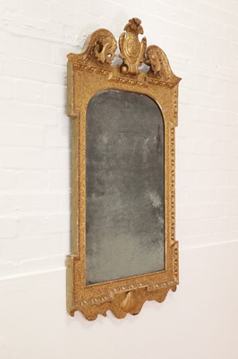 Lot 184 - A pair of George II gilt gesso pier mirrors