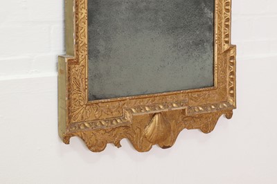 Lot 184 - A pair of George II gilt gesso pier mirrors