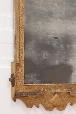 Lot 184 - A pair of George II gilt gesso pier mirrors
