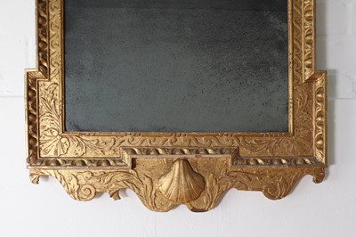Lot 184 - A pair of George II gilt gesso pier mirrors