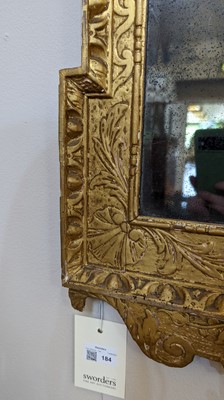 Lot 184 - A pair of George II gilt gesso pier mirrors