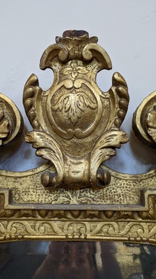 Lot 184 - A pair of George II gilt gesso pier mirrors