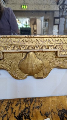 Lot 184 - A pair of George II gilt gesso pier mirrors