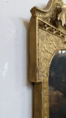 Lot 184 - A pair of George II gilt gesso pier mirrors
