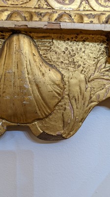 Lot 184 - A pair of George II gilt gesso pier mirrors
