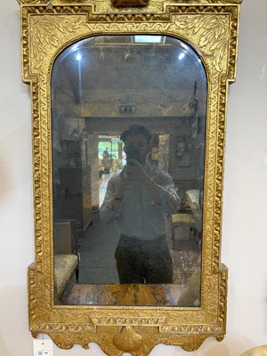 Lot 184 - A pair of George II gilt gesso pier mirrors