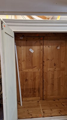 Lot 26 - A painted pine wardrobe