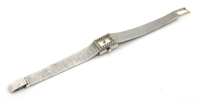 Lot 225 - A ladies' 18ct white gold Delano diamond set mechanical cocktail watch, c.1970