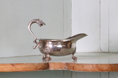 Lot 343 - A George II silver sauce or cream boat