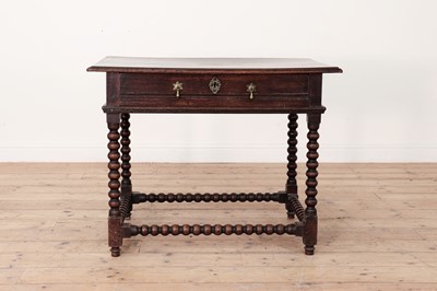 Lot 258 - A James II oak side table