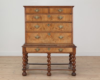 Lot 264 - A William and Mary walnut and feather band chest on stand