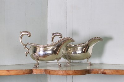 Lot 356 - A pair of Edwardian silver sauce or gravy boats