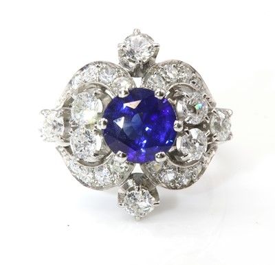 Lot 221 - A sapphire and diamond cocktail ring, c.1940