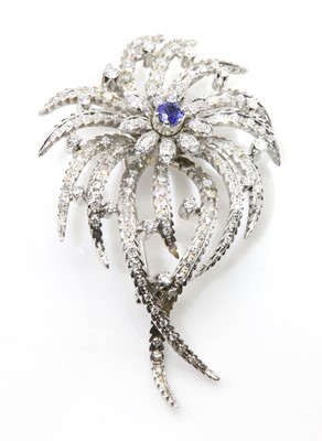 Lot 218 - A sapphire and diamond spray brooch, c.1950