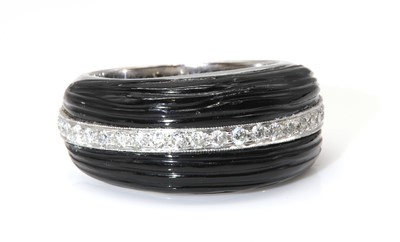 Lot 294 - A white gold carved onyx and diamond tapered band ring, attributed to Amanda Wakeley, c.2007