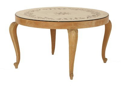 Lot 443 - A circular mirror-mounted coffee table