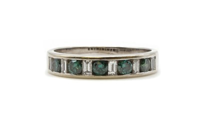 Lot 153 - A white gold enhanced blue diamond and diamond ring, by Sofia Fiori
