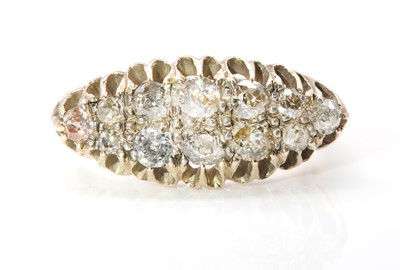 Lot 38 - An Edwardian two row diamond boat shaped ring
