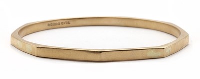 Lot 411 - A 9ct gold hollow bangle
