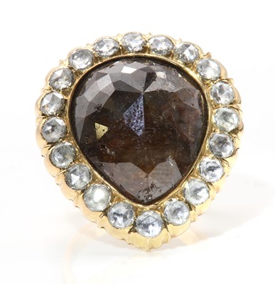 Lot 477 - A fancy brown diamond pear shaped cluster ring