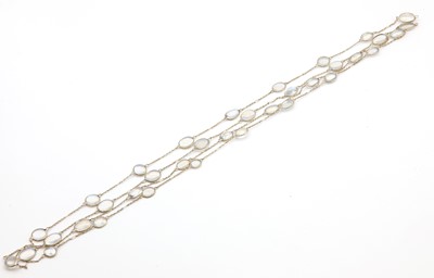 Lot 123 - An Edwardian moonstone long chain