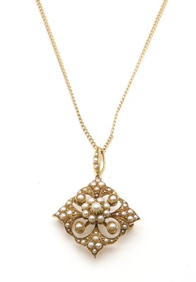 Lot 117 - A late Victorian split pearl pendant/brooch, c.1900