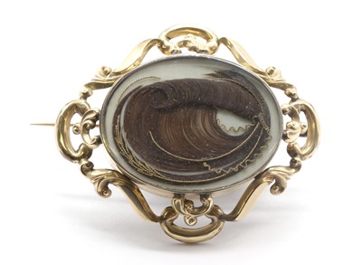 Lot 9 - A Victorian gold memorial brooch