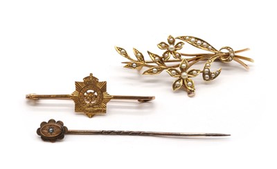 Lot 375 - A gold split pearl spray brooch