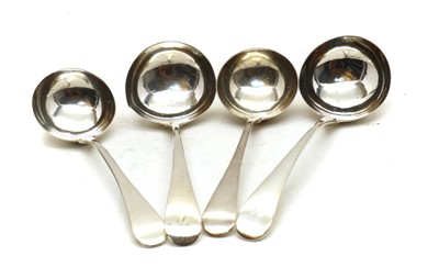 Lot 35 - A pair of George III silver Old English pattern sauce ladles