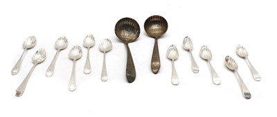 Lot 36 - A pair of George III Irish silver bright-cut engraved sauce ladles