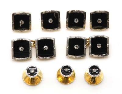 Lot 184 - An Art Deco diamond and onyx dress stud set, c.1925