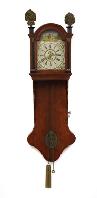 Lot 483 - A Dutch oak cased hooded drop dial wall clock