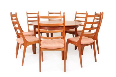 Lot 283 - A Danish teak dining suite